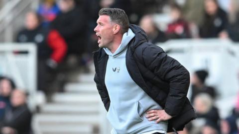 Rob Edwards bellows at his Middlesbrough players from the touchline
