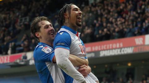 Callum Brittain and Tyrhys Dolan celebrating