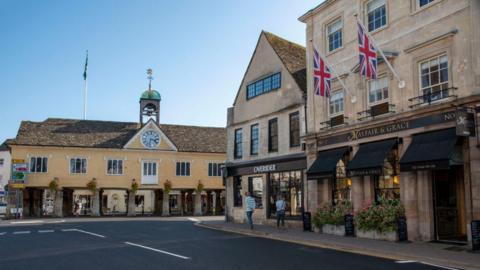 Tetbury town centre, with the yellow market house in the background