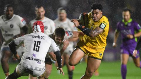 Dragons centre Fetuli Paea carries in the build-up to Angus O'Brien's try against Sharks