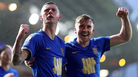 Birmingham goalscorer Jay Stansfield punches the air in celebration