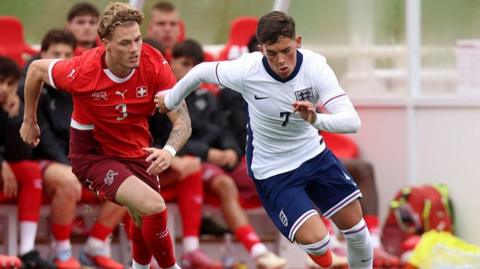 England winger Shea Lacey takes on the Switzerland defence during the 1-0 Under-20 international defeat at St George's Park