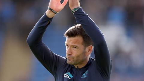 Cardiff City boss Brian Barry-Murphy applauds