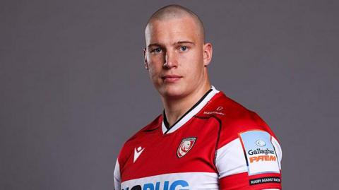 Hugh Bokenham poses in Gloucester shirt