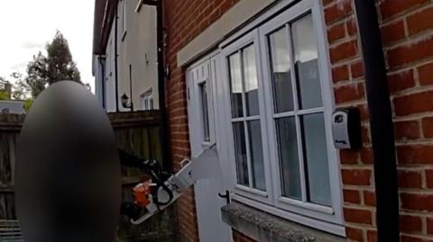 Police use chainsaw to quickly access drug dealer's home
