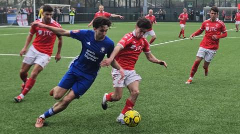 Action from Jersey Bulls v Hassocks