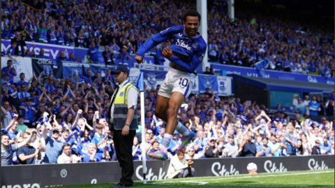 Everton's Iliman Ndiaye celebrates scoring against Southampton in front of packed stands at Goodison Park