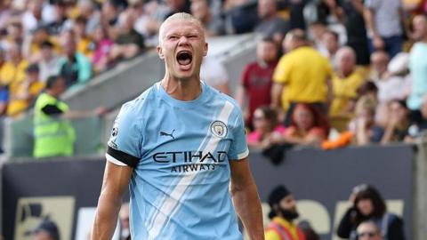 Erling Haaland celebrates scoring a goal
