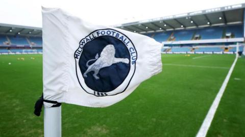 A Millwall-branded corner flag at The Den