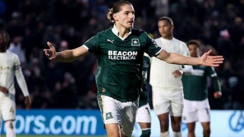 Lorent Tolaj celebrates scoring for Plymouth 