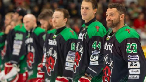 Cardiff Devils players line up before a game