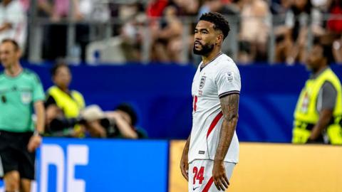 Reece James standing on the pitch during England's World Cup game against Croatia