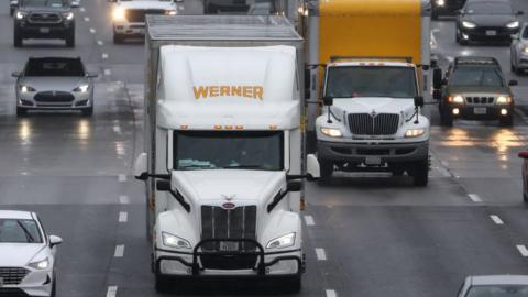 Trucks and cars on a highway in the US