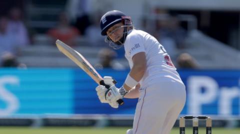 Heather Knight plays a shot