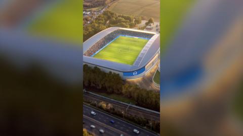 A computer generated aerial view image of a blue and white football stadium