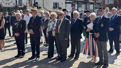People gathered in Sandwich in Kent, some in military veterans uniform to mark the start of Armed Forces Week on Monday