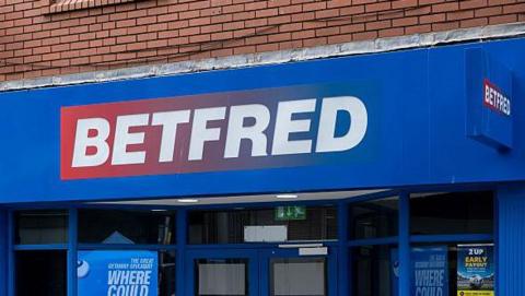 A Betfred shop with a blue shop front.