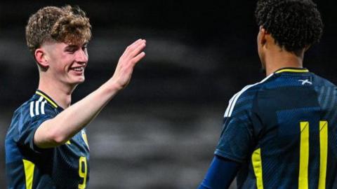 James Wilson celebrates