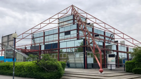 A close up of The Point, Britain's first multiplex cinema. Its pyramid structure is made of up metal and glass. 