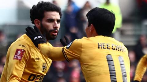 Wolves players celebrate