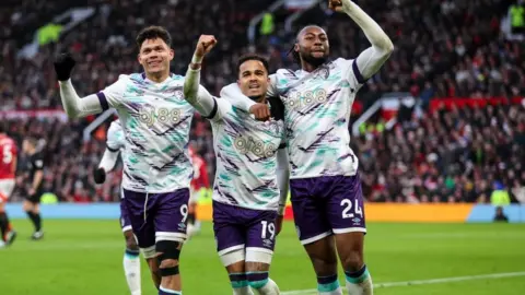 Bournemouth's Justin Kluivert (centre) celebrates his goal at Old Trafford