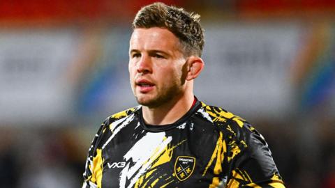 Elliot Dee warming up ahead of Dragons' United Rugby Championship opener against Ulster in Belfast