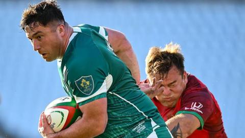 Tom Clarkson carries the ball