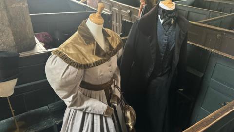 Gentleman Jack costumes on display at Holy Trinity Church