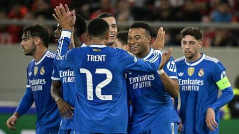 Kylian Mbappe celebrates with Real Madrid team-mates 