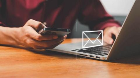 Human touch on email and surfing the internet with email icon