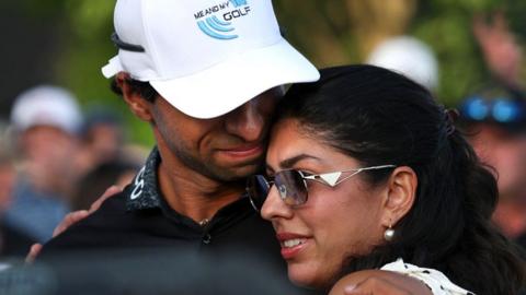 Aaron Rai in an embrace with wife Gaurika Bishnoi Rai