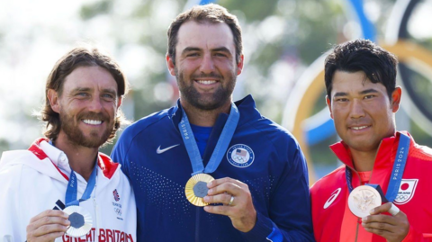 Tommy Fleetwood, Scottie Scheffler and Hideki Matsuyama with their Olympic medals