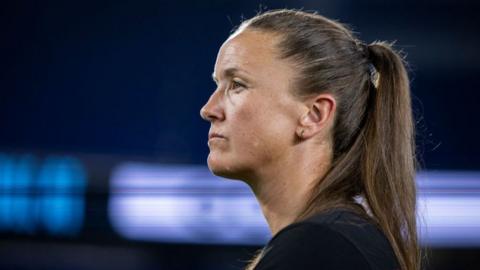 Casey Stoney looks on while in charge of San Diego Wave