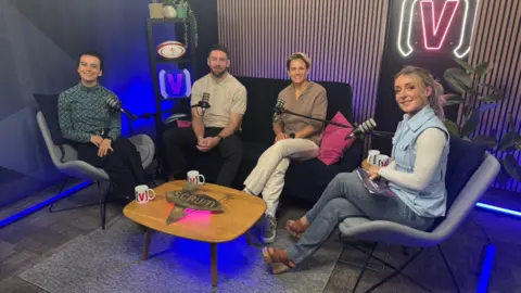 Claire Thomas, Alex Cuthbert, Philippa Tuttiett and Lauren Salter on the Scrum V set