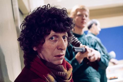 Tom Baker as The Doctor looking straight at the camera in The Genesis of the Daleks