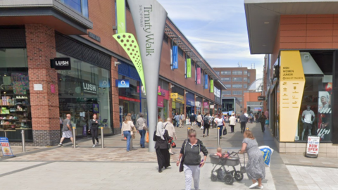 A busy, modern shopping street
