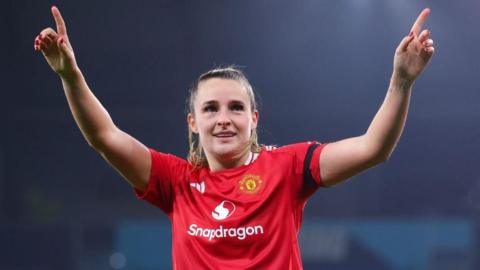 Ella Toone celebrates scoring for Manchester United against Manchester City in the WSL