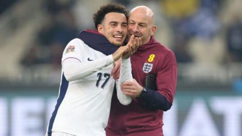 England interim manager Lee Carsley celebrates with debutant goalscorer Curtis Jones after the win in Greece