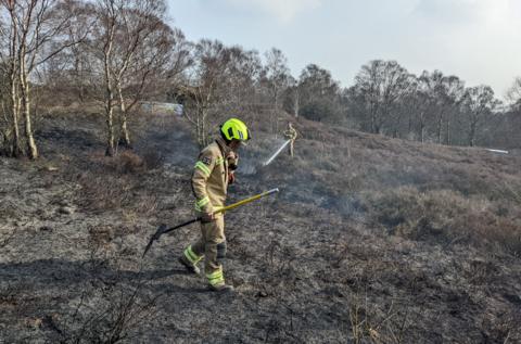 Firefighters tackle a blaze