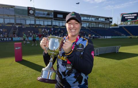 Glamorgan captain Lauren Parfitt lifting the Vitality Women's T20 Blast League 2 trophy after defeating Gloucestershire.
