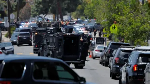Police respond to reports of an active shooter at a mosque in San Diego