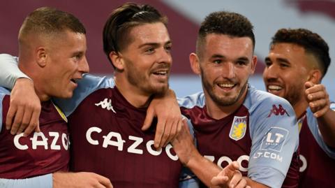 Aston Villa players celebrate