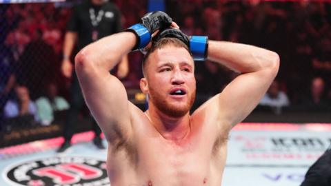 Justin Gaethje celebrates after beating Dustin Poirier in 2023