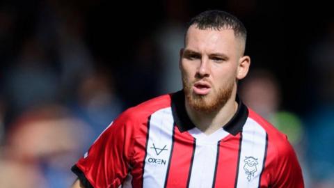 Ben House in action for Lincoln City