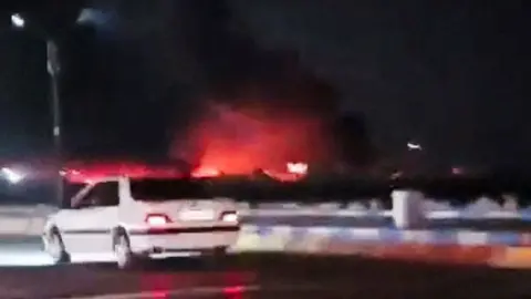 A still from a video showing an explosion in Bandar Abbas, Iran