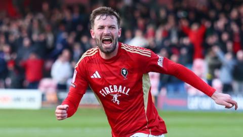 Matt Butcher celebrates scoring Salford's winning goal against Notts County 