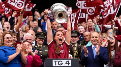 Kate Gerhagty lifts the All-Ireland for Galway