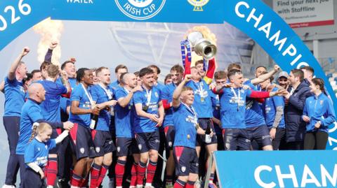Coleraine celebrate winning the cup