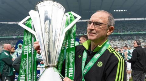 Celtic manager Martin O'Neill with the Scottish Premiership trophy