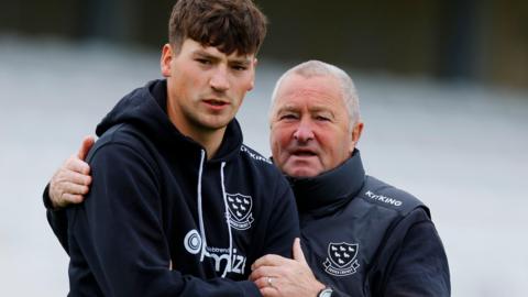 Henry Crocombe with Sussex head coach Paul Farbrace